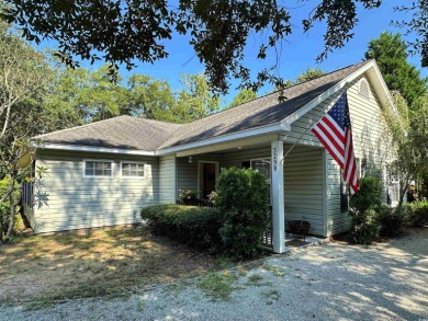 Charming One-Level DUPLEX just a mile from the beach! Looking on True Blue Plantation in South Carolina - for sale on GolfHomes.com, golf home, golf lot