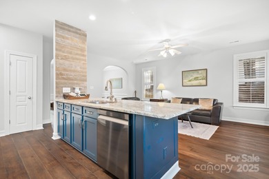 This beautifully-maintained 4-bedroom home with a welcoming on The Peninsula Club in North Carolina - for sale on GolfHomes.com, golf home, golf lot