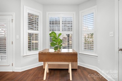 This beautifully-maintained 4-bedroom home with a welcoming on The Peninsula Club in North Carolina - for sale on GolfHomes.com, golf home, golf lot