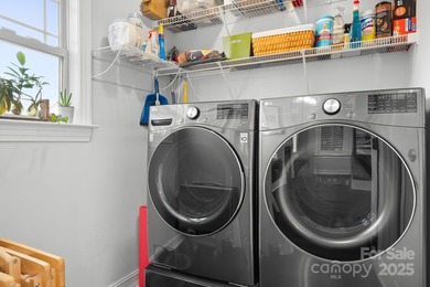 This beautifully-maintained 4-bedroom home with a welcoming on The Peninsula Club in North Carolina - for sale on GolfHomes.com, golf home, golf lot