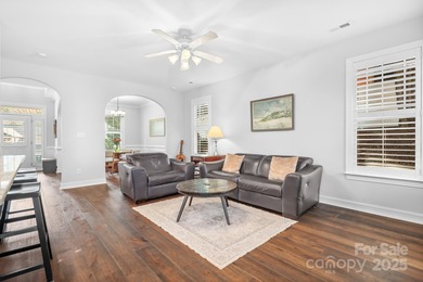 This beautifully-maintained 4-bedroom home with a welcoming on The Peninsula Club in North Carolina - for sale on GolfHomes.com, golf home, golf lot