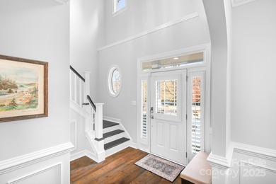 This beautifully-maintained 4-bedroom home with a welcoming on The Peninsula Club in North Carolina - for sale on GolfHomes.com, golf home, golf lot