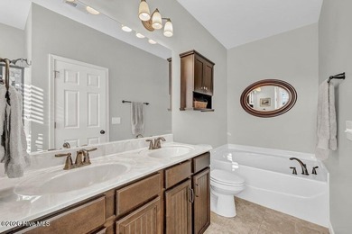 This 3 bedroom, 2 bath home in Compass Pointe offers over 1,600 on Compass Pointe Golf Course in North Carolina - for sale on GolfHomes.com, golf home, golf lot