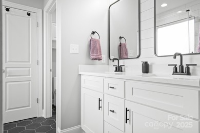 This beautifully-maintained 4-bedroom home with a welcoming on The Peninsula Club in North Carolina - for sale on GolfHomes.com, golf home, golf lot