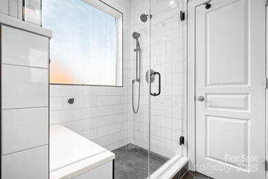 This beautifully-maintained 4-bedroom home with a welcoming on The Peninsula Club in North Carolina - for sale on GolfHomes.com, golf home, golf lot