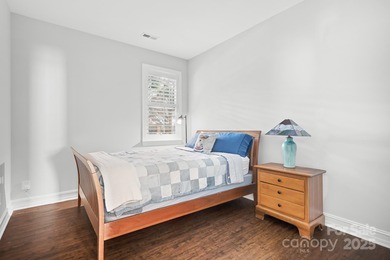 This beautifully-maintained 4-bedroom home with a welcoming on The Peninsula Club in North Carolina - for sale on GolfHomes.com, golf home, golf lot