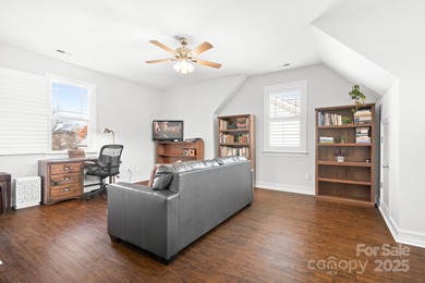 This beautifully-maintained 4-bedroom home with a welcoming on The Peninsula Club in North Carolina - for sale on GolfHomes.com, golf home, golf lot