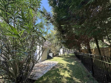 Charming One-Level DUPLEX just a mile from the beach! Looking on True Blue Plantation in South Carolina - for sale on GolfHomes.com, golf home, golf lot