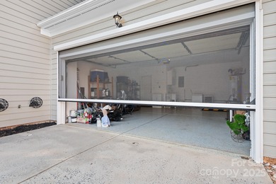 This beautifully-maintained 4-bedroom home with a welcoming on The Peninsula Club in North Carolina - for sale on GolfHomes.com, golf home, golf lot