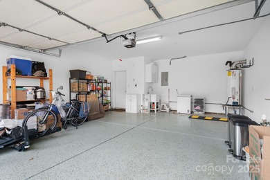 This beautifully-maintained 4-bedroom home with a welcoming on The Peninsula Club in North Carolina - for sale on GolfHomes.com, golf home, golf lot