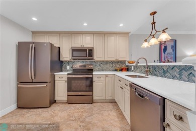 Welcome! This spacious 2/2 in Palm Aire features renovated and on Palm-Aire Country Club and Resort - Palms in Florida - for sale on GolfHomes.com, golf home, golf lot