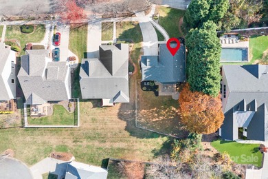 This beautifully-maintained 4-bedroom home with a welcoming on The Peninsula Club in North Carolina - for sale on GolfHomes.com, golf home, golf lot
