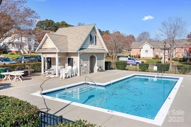 This beautifully-maintained 4-bedroom home with a welcoming on The Peninsula Club in North Carolina - for sale on GolfHomes.com, golf home, golf lot