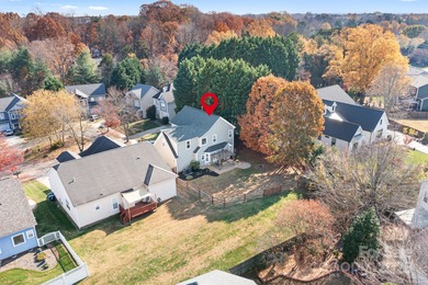 This beautifully-maintained 4-bedroom home with a welcoming on The Peninsula Club in North Carolina - for sale on GolfHomes.com, golf home, golf lot