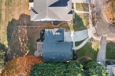 This beautifully-maintained 4-bedroom home with a welcoming on The Peninsula Club in North Carolina - for sale on GolfHomes.com, golf home, golf lot