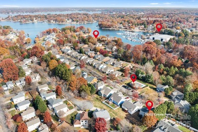 This beautifully-maintained 4-bedroom home with a welcoming on The Peninsula Club in North Carolina - for sale on GolfHomes.com, golf home, golf lot