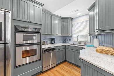 This beautifully updated three bedroom, three bathroom townhome on Wild Dunes Harbor Golf Resort in South Carolina - for sale on GolfHomes.com, golf home, golf lot