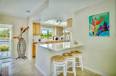 This stylish & charming lake front home with coastal flair & on Lakewood Country Club in Florida - for sale on GolfHomes.com, golf home, golf lot