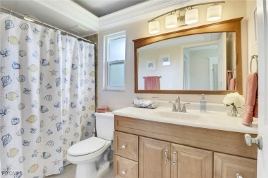 This stylish & charming lake front home with coastal flair & on Lakewood Country Club in Florida - for sale on GolfHomes.com, golf home, golf lot