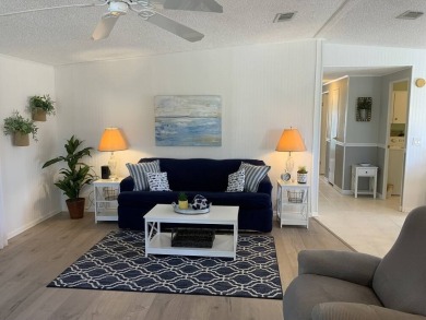 The Lot Rent for this home is $1,248.00/monthly.  You can walk on Pine Lakes Country Club in Florida - for sale on GolfHomes.com, golf home, golf lot