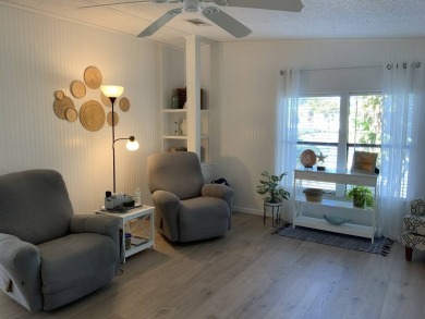 The Lot Rent for this home is $1,248.00/monthly.  You can walk on Pine Lakes Country Club in Florida - for sale on GolfHomes.com, golf home, golf lot