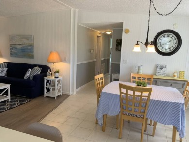 The Lot Rent for this home is $1,248.00/monthly.  You can walk on Pine Lakes Country Club in Florida - for sale on GolfHomes.com, golf home, golf lot