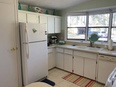 The Lot Rent for this home is $1,248.00/monthly.  You can walk on Pine Lakes Country Club in Florida - for sale on GolfHomes.com, golf home, golf lot