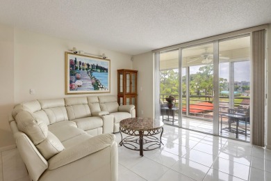 WELCOME TO THIS NATURALLY BRIGHT CONDO WITH SOUTH FACING VIEWS on Poinciana Golf Club in Florida - for sale on GolfHomes.com, golf home, golf lot