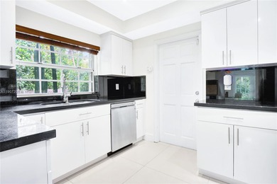 Discover your private Coral Gables retreat on a quiet on Granada Golf Club in Florida - for sale on GolfHomes.com, golf home, golf lot