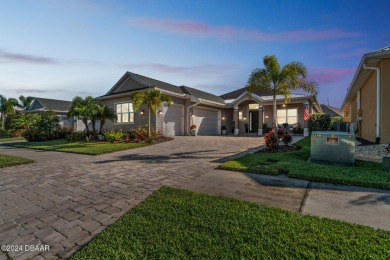 Stunning pool home in the exclusive gated golf course community on Venetian Bay Golf Course in Florida - for sale on GolfHomes.com, golf home, golf lot