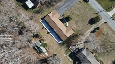 One level ranch in Pine Knolls subdivision!  This property has on Pine Knolls Golf Course in North Carolina - for sale on GolfHomes.com, golf home, golf lot