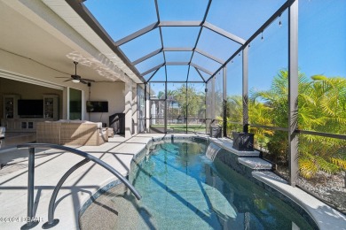 Stunning pool home in the exclusive gated golf course community on Venetian Bay Golf Course in Florida - for sale on GolfHomes.com, golf home, golf lot