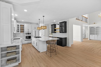 This beautifully renovated home sits along the Ocean #5 fairway on Country Club of Landfall in North Carolina - for sale on GolfHomes.com, golf home, golf lot