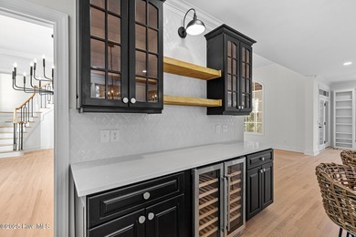 This beautifully renovated home sits along the Ocean #5 fairway on Country Club of Landfall in North Carolina - for sale on GolfHomes.com, golf home, golf lot