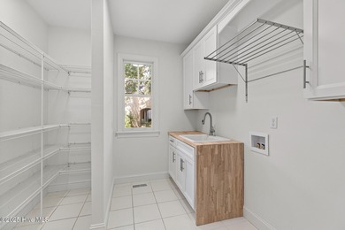 This beautifully renovated home sits along the Ocean #5 fairway on Country Club of Landfall in North Carolina - for sale on GolfHomes.com, golf home, golf lot