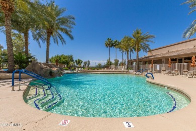 Discover vibrant living in this charming 2-bedroom, 2-bath + den on Springfield Golf Resort in Arizona - for sale on GolfHomes.com, golf home, golf lot