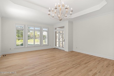 This beautifully renovated home sits along the Ocean #5 fairway on Country Club of Landfall in North Carolina - for sale on GolfHomes.com, golf home, golf lot