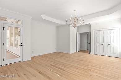 This beautifully renovated home sits along the Ocean #5 fairway on Country Club of Landfall in North Carolina - for sale on GolfHomes.com, golf home, golf lot