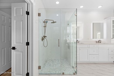 This beautifully renovated home sits along the Ocean #5 fairway on Country Club of Landfall in North Carolina - for sale on GolfHomes.com, golf home, golf lot