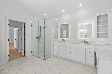 This beautifully renovated home sits along the Ocean #5 fairway on Country Club of Landfall in North Carolina - for sale on GolfHomes.com, golf home, golf lot