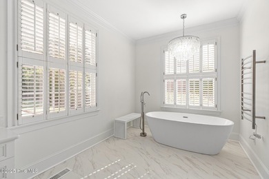 This beautifully renovated home sits along the Ocean #5 fairway on Country Club of Landfall in North Carolina - for sale on GolfHomes.com, golf home, golf lot