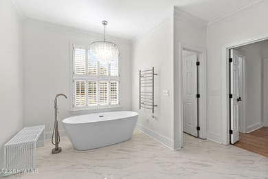 This beautifully renovated home sits along the Ocean #5 fairway on Country Club of Landfall in North Carolina - for sale on GolfHomes.com, golf home, golf lot