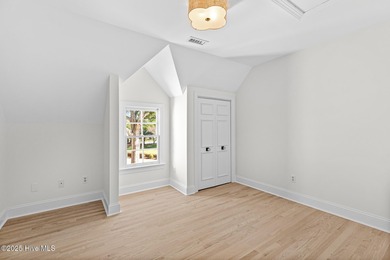 This beautifully renovated home sits along the Ocean #5 fairway on Country Club of Landfall in North Carolina - for sale on GolfHomes.com, golf home, golf lot