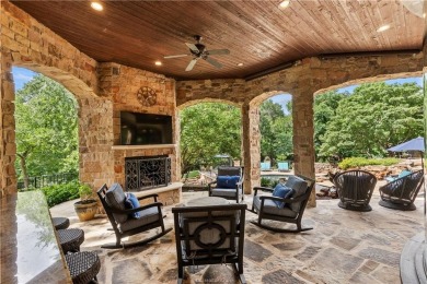 This custom estate sits on a rare 1.4-acre wooded lot backing to on The Traditions Club At Texas A and M in Texas - for sale on GolfHomes.com, golf home, golf lot