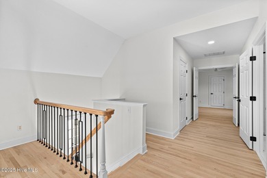 This beautifully renovated home sits along the Ocean #5 fairway on Country Club of Landfall in North Carolina - for sale on GolfHomes.com, golf home, golf lot