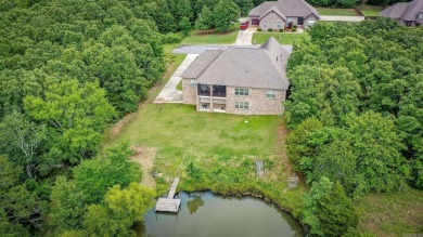What a VIEW of the lake-pure serenity!  Enjoy this custom home on Greystone Country Club in Arkansas - for sale on GolfHomes.com, golf home, golf lot