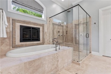 This custom estate sits on a rare 1.4-acre wooded lot backing to on The Traditions Club At Texas A and M in Texas - for sale on GolfHomes.com, golf home, golf lot