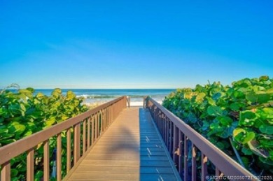 Beach Front! This magnificent 1-bedroom, 2-bathroom residence is on Island Dunes Country Club in Florida - for sale on GolfHomes.com, golf home, golf lot