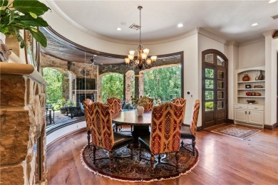 This custom estate sits on a rare 1.4-acre wooded lot backing to on The Traditions Club At Texas A and M in Texas - for sale on GolfHomes.com, golf home, golf lot
