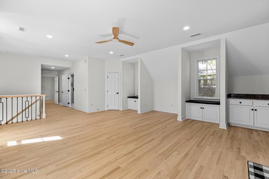 This beautifully renovated home sits along the Ocean #5 fairway on Country Club of Landfall in North Carolina - for sale on GolfHomes.com, golf home, golf lot